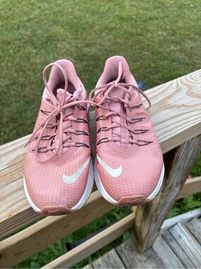 Nike Women’s Coral Pink Mesh Running Shoes with White Swoosh